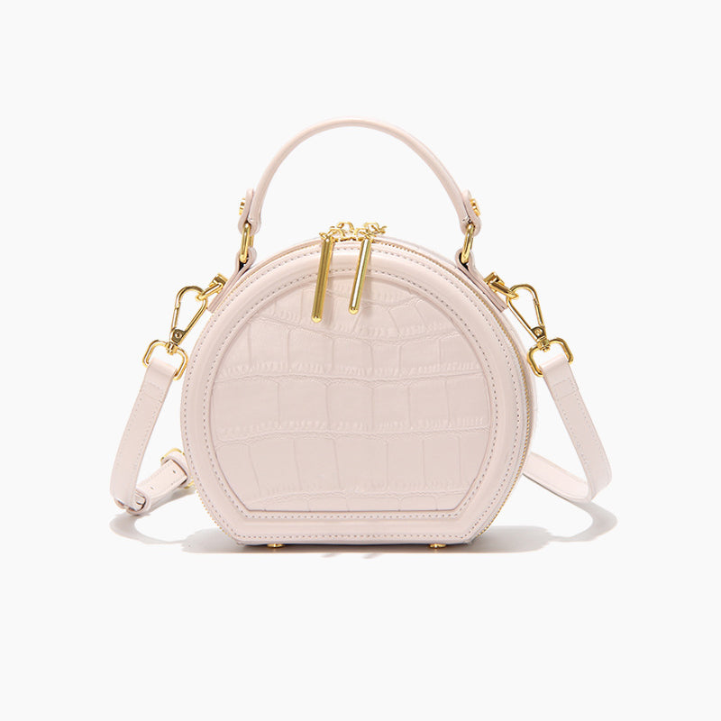 Women’s Stone Grain Round Crossbody Handbag in Pink image