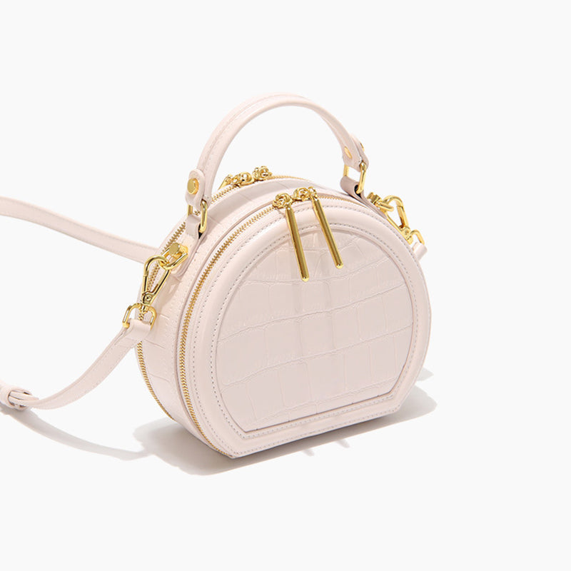 Women’s Stone Grain Round Crossbody Handbag in Pink image 4