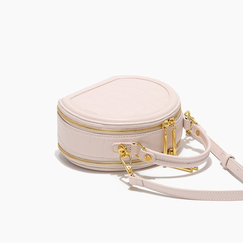 Women’s Stone Grain Round Crossbody Handbag in Pink image 3