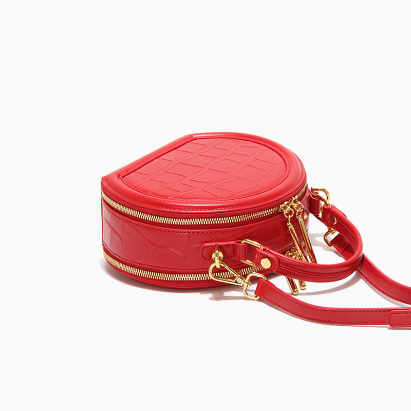 Women’s Stone Grain Round Crossbody Handbag in Red image 3