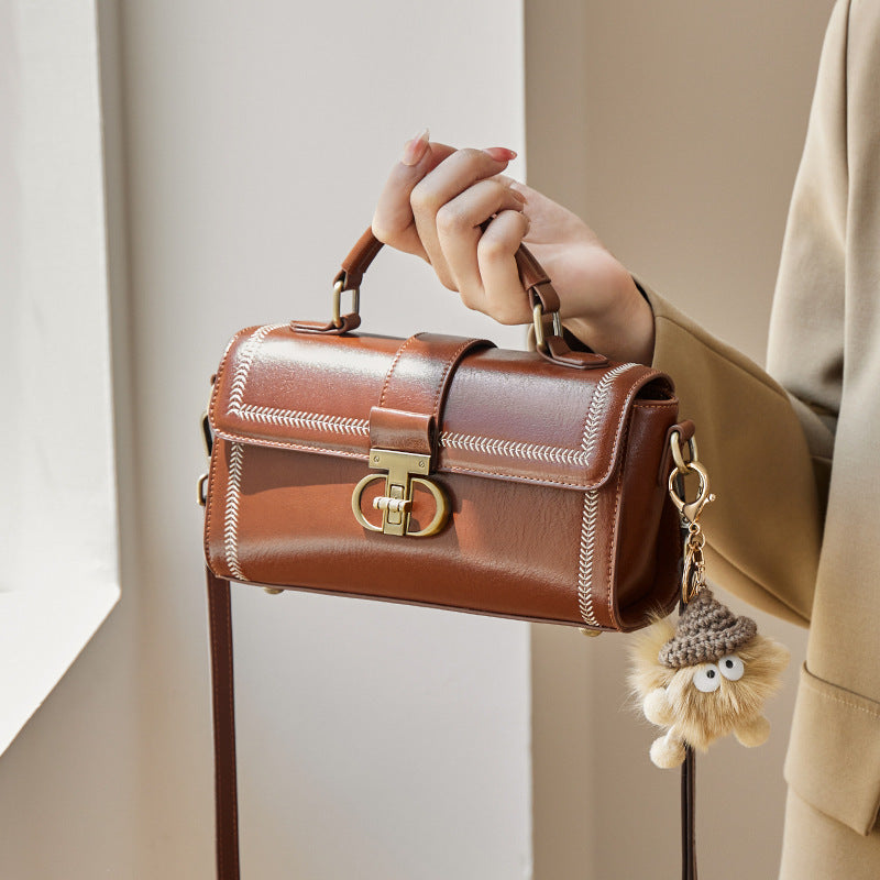 Women’s Vintage Genuine Leather Crossbody Top Handle Bag with Lock Closure image 4